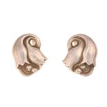 Georg Jensen - a pair of 'tulip' earrings, of stylised tulip form, repoussé and chased with clip-