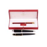 Must de Cartier - A 'Saphir' fountain pen, boxed together with a Cartier ballpoint pen and another