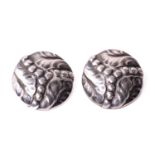 Georg Jensen - a pair of stylised foliate buttons, of repousséd and chased leaves with beaded