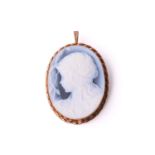 An Italian gold mounted hardstone cameo brooch cum pendant, the cameo depicting a profile of a young