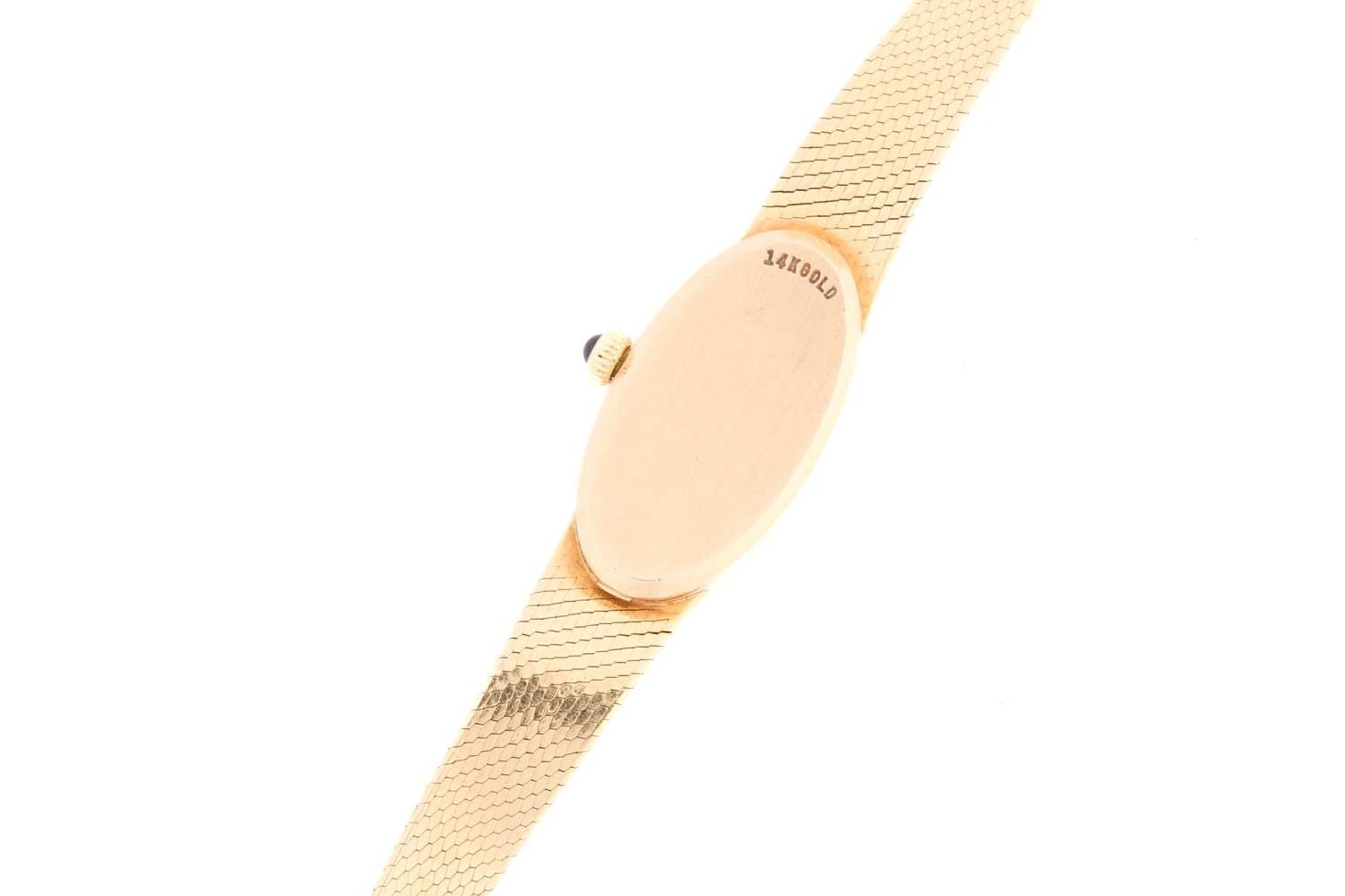 A ladies Movado 14ct yellow gold mechanical wristwatch, the plain gilt dial surrounded by a - Image 6 of 8