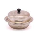 A silver muffin dish and cover, of traditional form with ebonised finial to domed cover. Comprising,