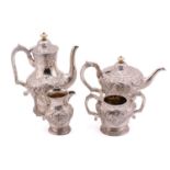 A good quality silver four-piece tea set, Birmingham 1886, comprising a teapot and coffee pot both