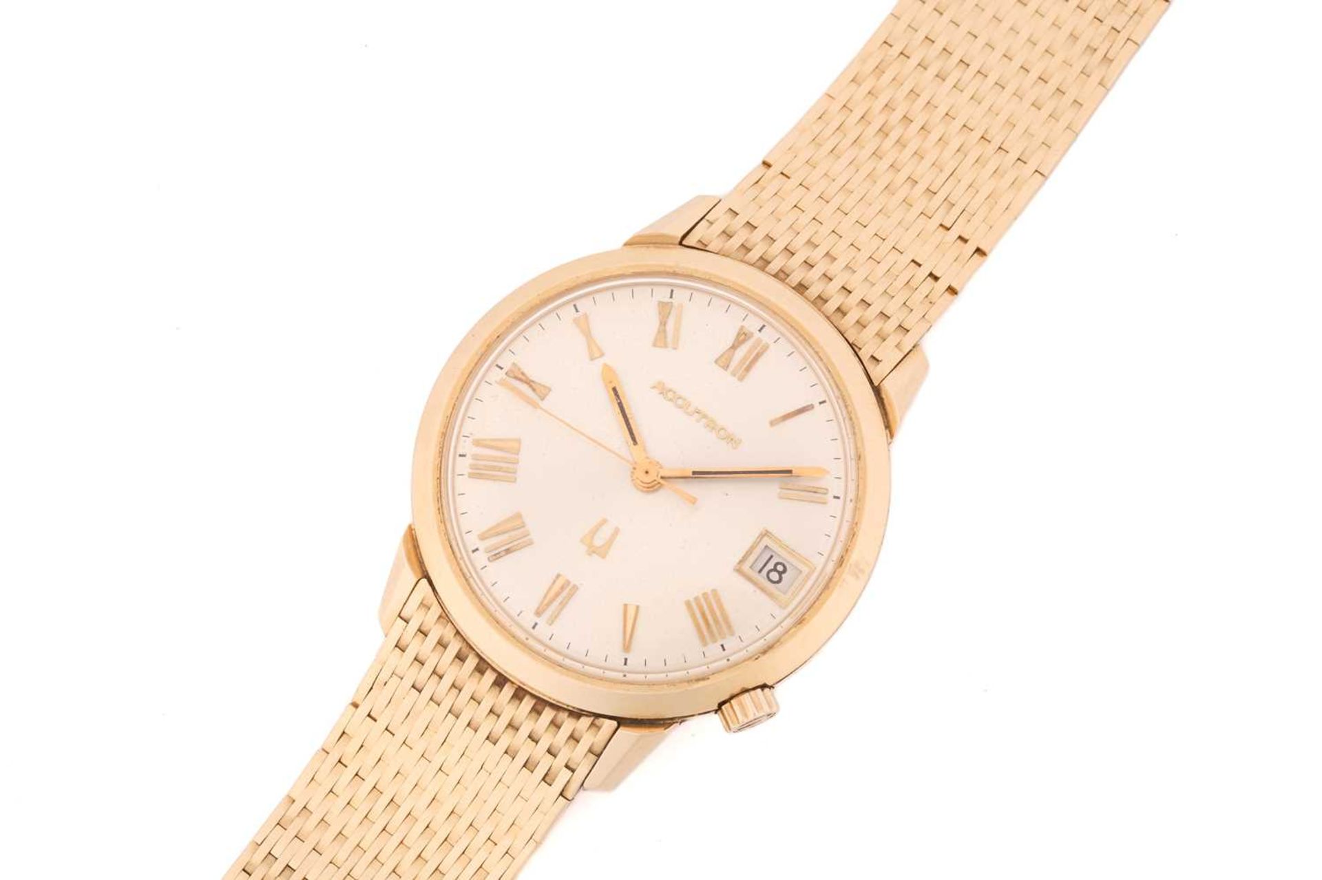 An 18ct gold Bulova Accutron wristwatch, the circular white face with gilt roman numerals and a date - Bild 2 aus 8