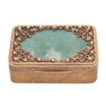 A continental silver gilt box with aventurine panel and set with seed pearls and rubies; rounded