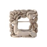 Georg Jensen - a square openwork brooch featuring a resting deer and squirrel in foliage, fitted