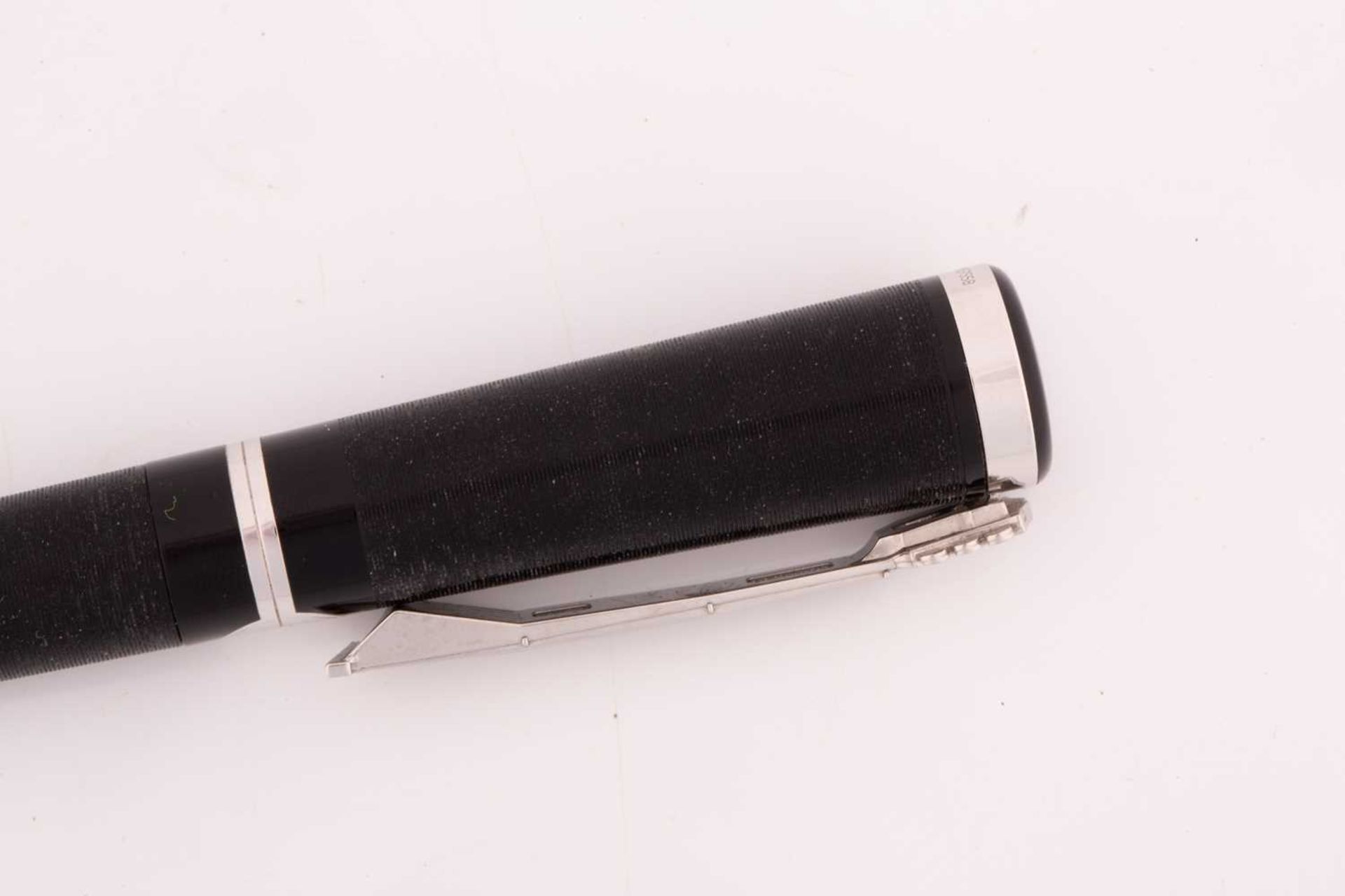 Montblanc John Lennon ballpoint pen the black resign grooved barrel with twist action, the white - Image 5 of 6