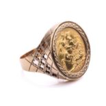 A sovereign coin ring in 9ct gold, comprising an Elizabeth II 1965 full sovereign, set in mount to