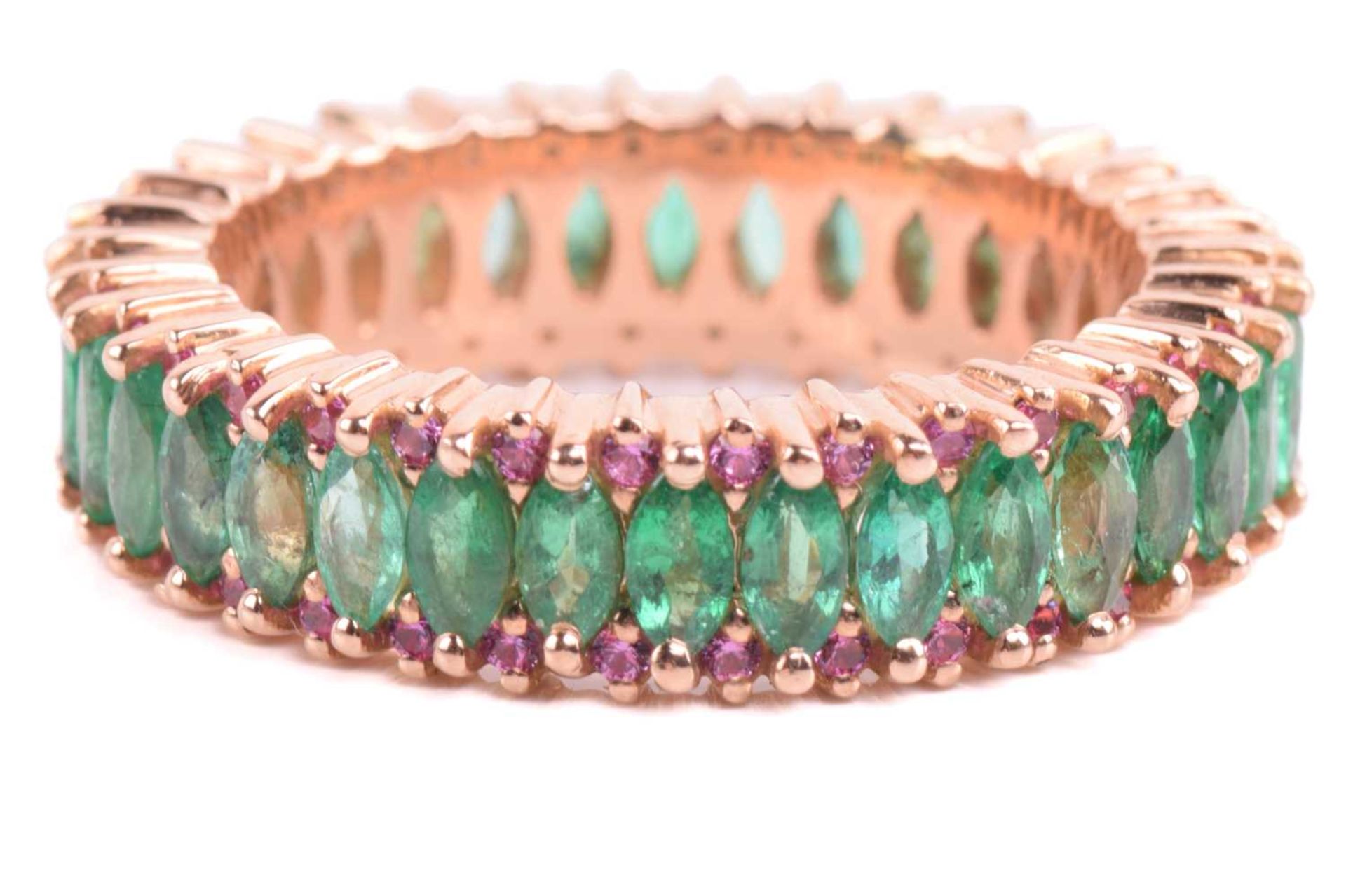 An emerald and pink sapphire eternity ring, centrally set with a row of marquise-cut emeralds, - Image 2 of 4
