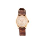 A Record Watch Co. Geneve 18ct yellow gold wristwatch, the silvered dial with gilt numerals and