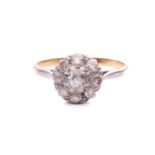 An old-cut diamond daisy head cluster ring, featuring a 4.5 x 4.5 x 2.4 mm old-cut diamond,