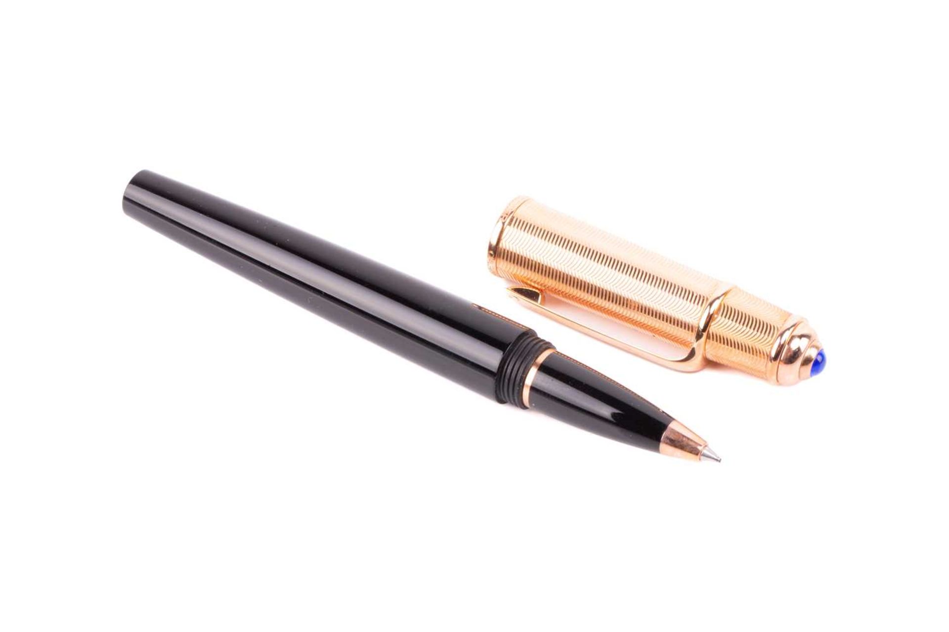 Cartier - A black composite rollerball pen with rose gold plated screw cap with blue glass - Image 2 of 8