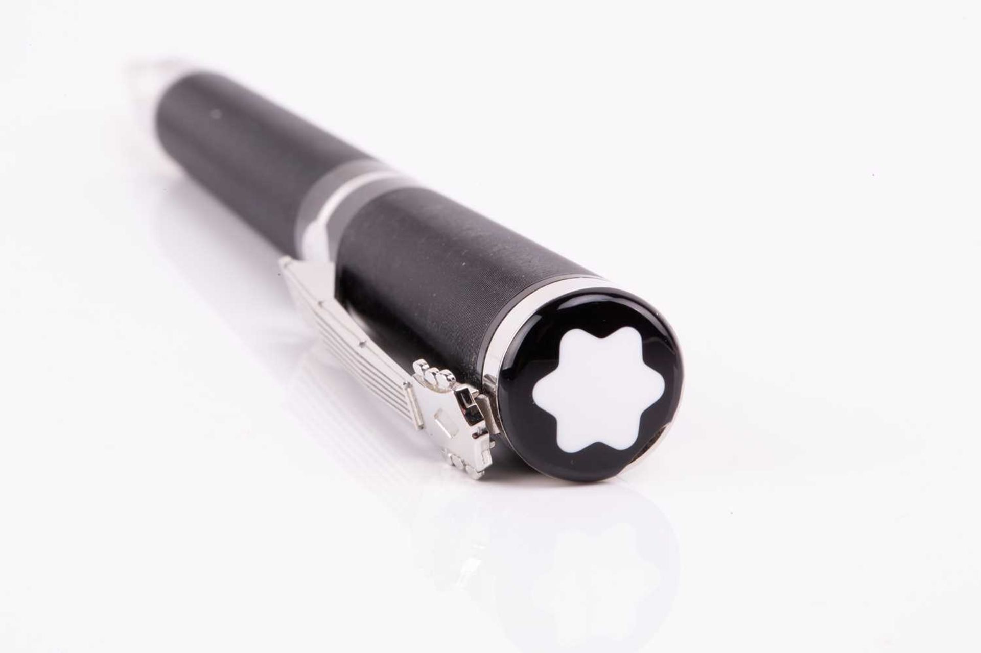 Montblanc John Lennon ballpoint pen the black resign grooved barrel with twist action, the white - Image 3 of 6