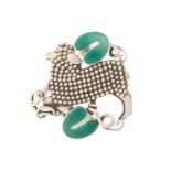 Georg Jensen - a brooch depicting a lamb flanked by two enamel ivy leaves, fitted with hinged pin