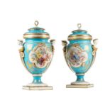 A pair of large Sevres porcelain bleu celeste urns and covers, 19th century, each with domed