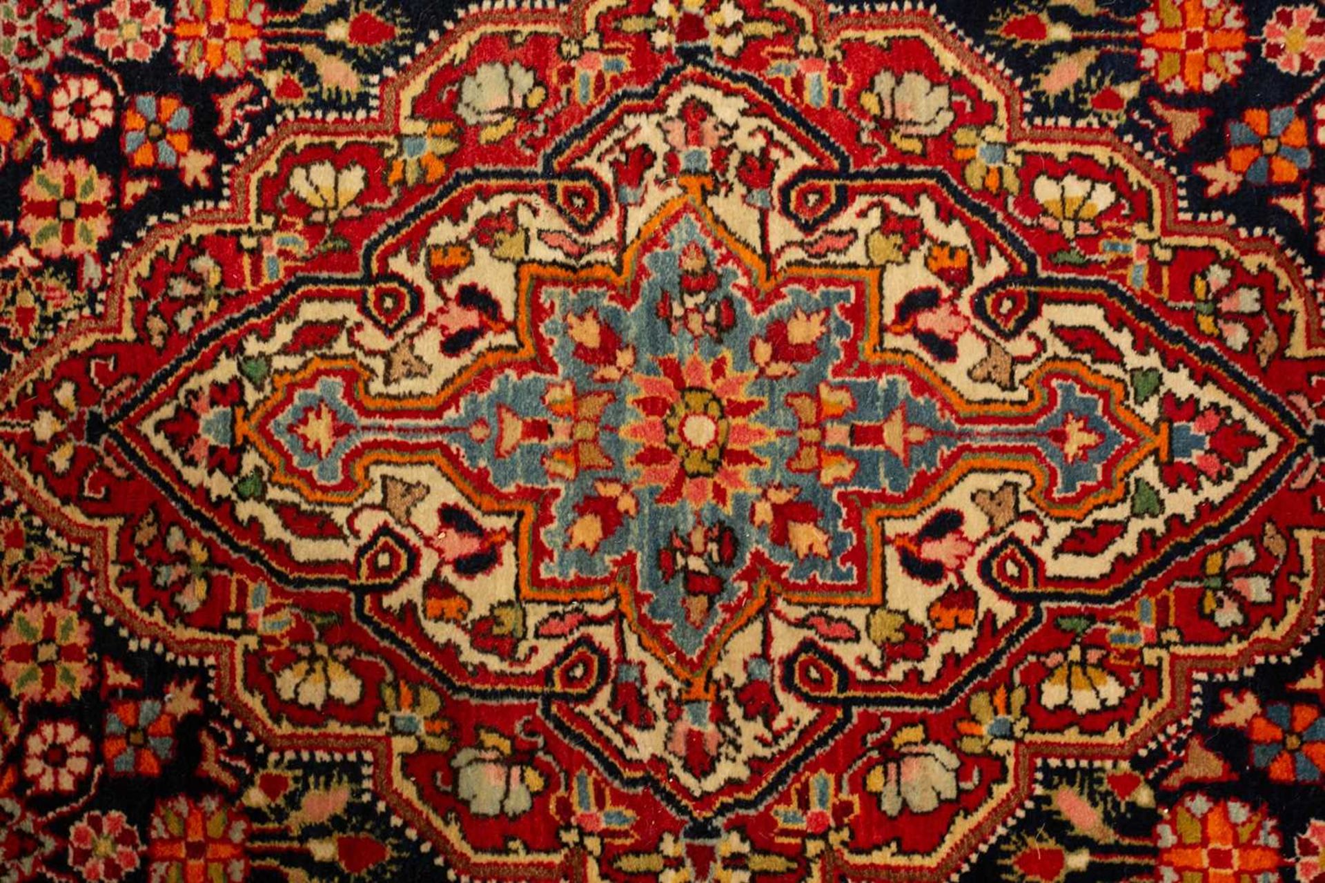 A dark blue ground Baktiari rug, 20th century, with a central lozenge with stylized lanterns - Image 4 of 5