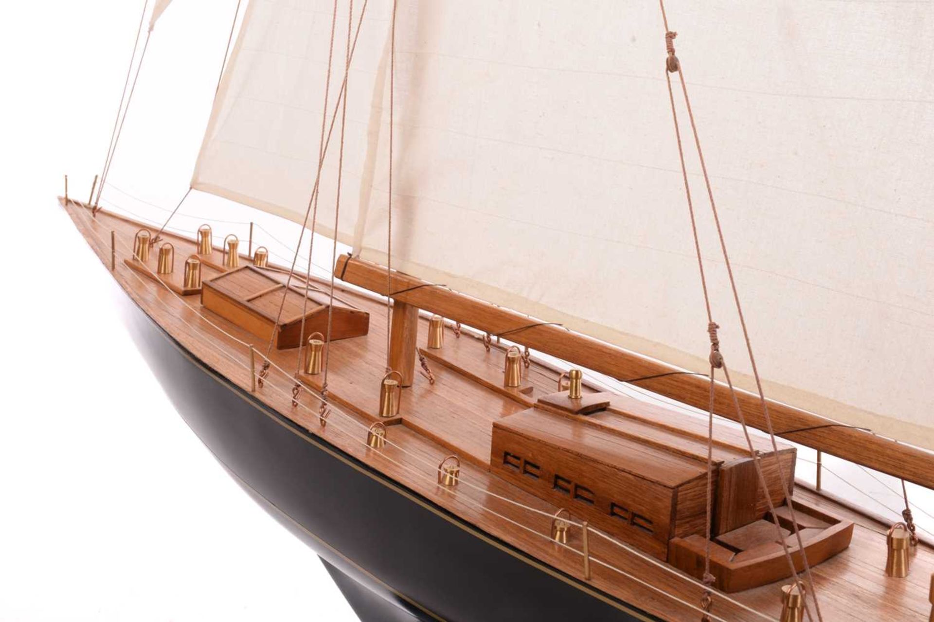 A painted and stained wood model of the yacht 'Endeavour', with fabric sales and rigging on a titled - Image 11 of 16
