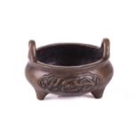 A Chinese bronze censer, possibly 19th century Qing, made for the Islamic market, with loop handles,