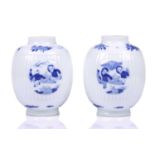 A pair of Chinese porcelain blue & white Kangxi style tea caddies, of barrel form with part reeded