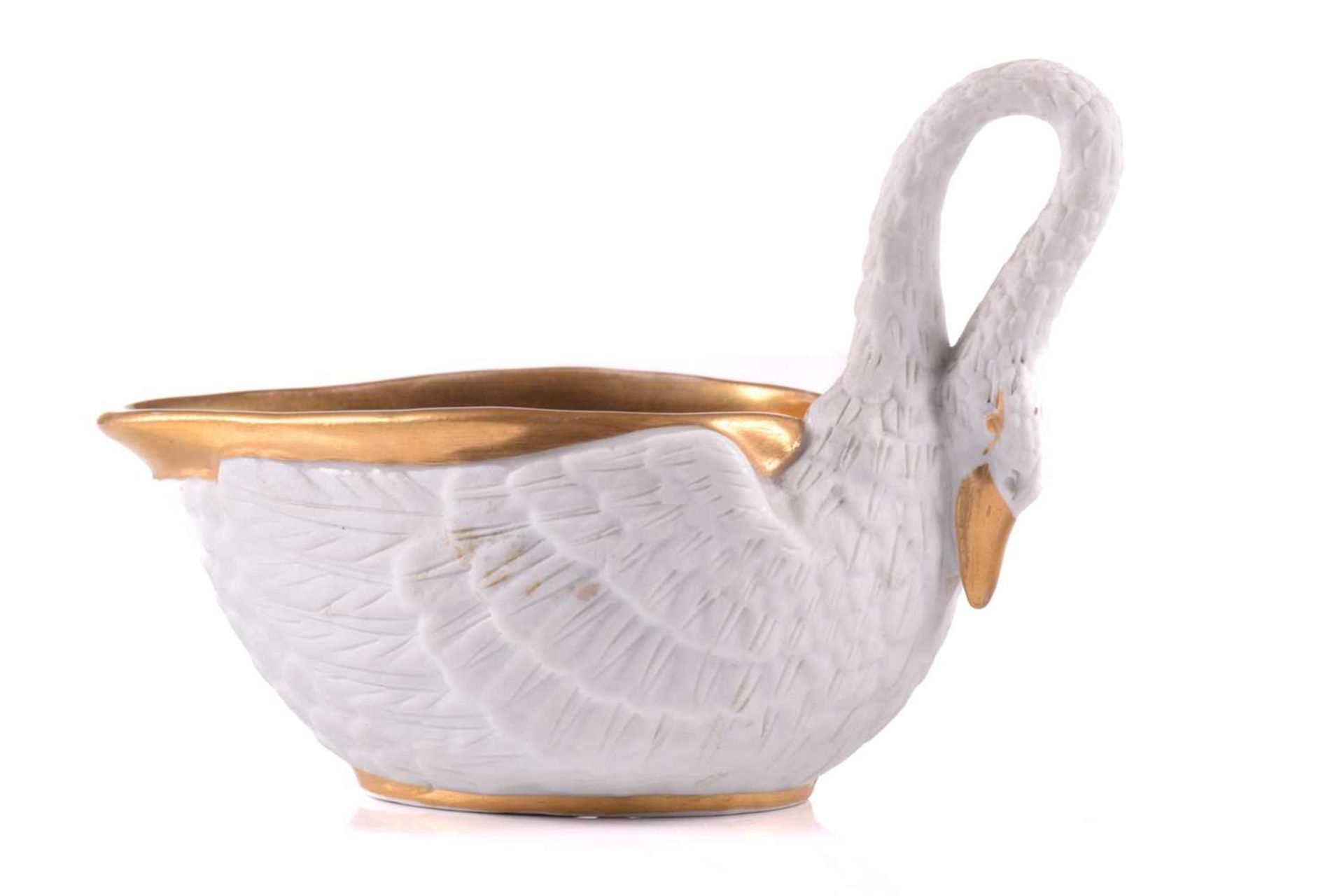 A Vienna bisque porcelain swan sauce boat early 20th century, with a gilded interior, based on an - Image 2 of 21