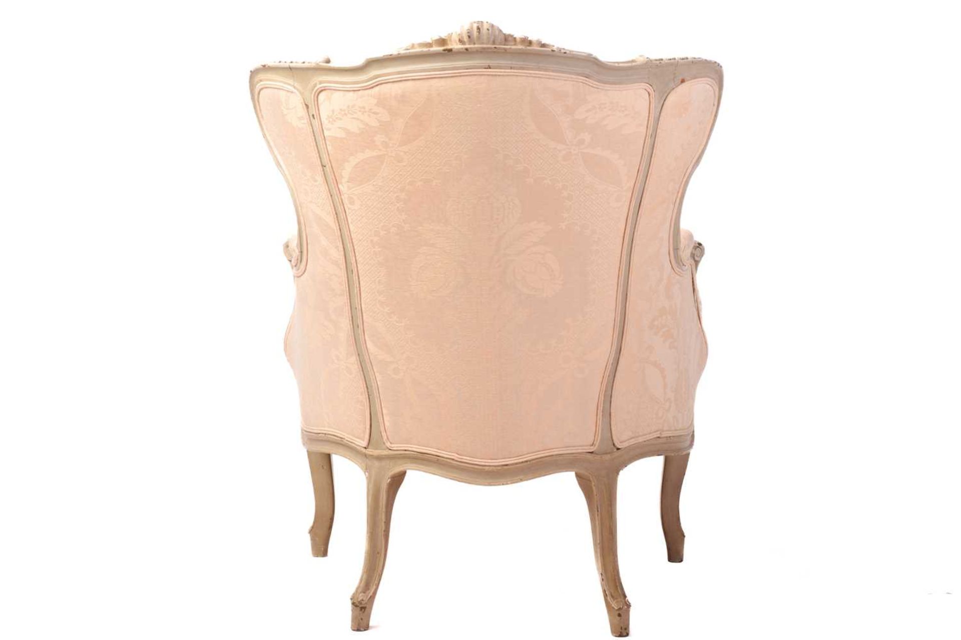 A French Louis XV-style dove grey painted bergere armchair with wing back and carved shell - Image 6 of 8