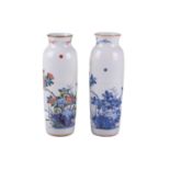 A very close pair of Chinese porcelain vases, Qing, each almost identically decorated in