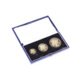 A President John F Kennedy memorial gold medal set, circa 1965, comprising three medals in 18ct