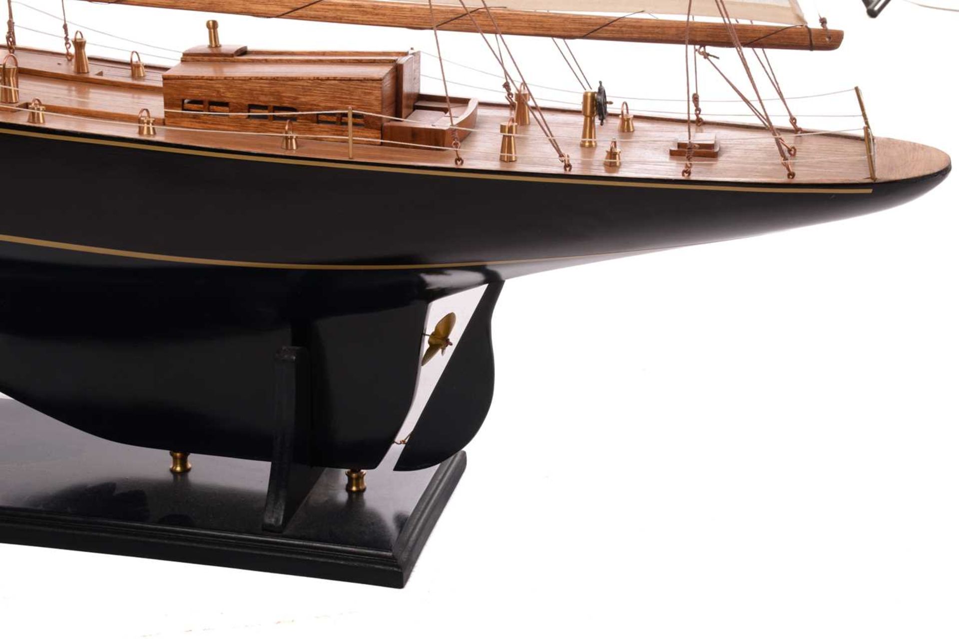 A painted and stained wood model of the yacht 'Endeavour', with fabric sales and rigging on a titled - Image 12 of 16