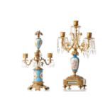 A Louis XVI style porcelain mounted gilt metal three-sconce candelabra with cut glass hanging