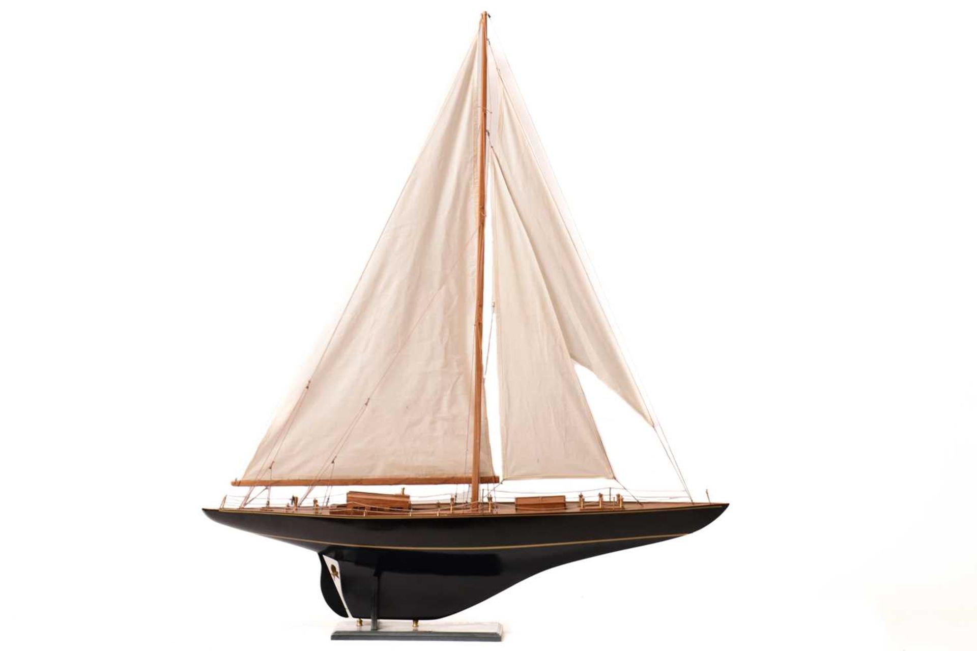 A painted and stained wood model of the yacht 'Endeavour', with fabric sales and rigging on a titled - Image 6 of 16