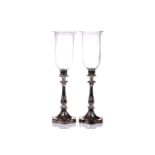 A pair of large and impressive silverplated and clear glass storm candle lanterns, 20th century,