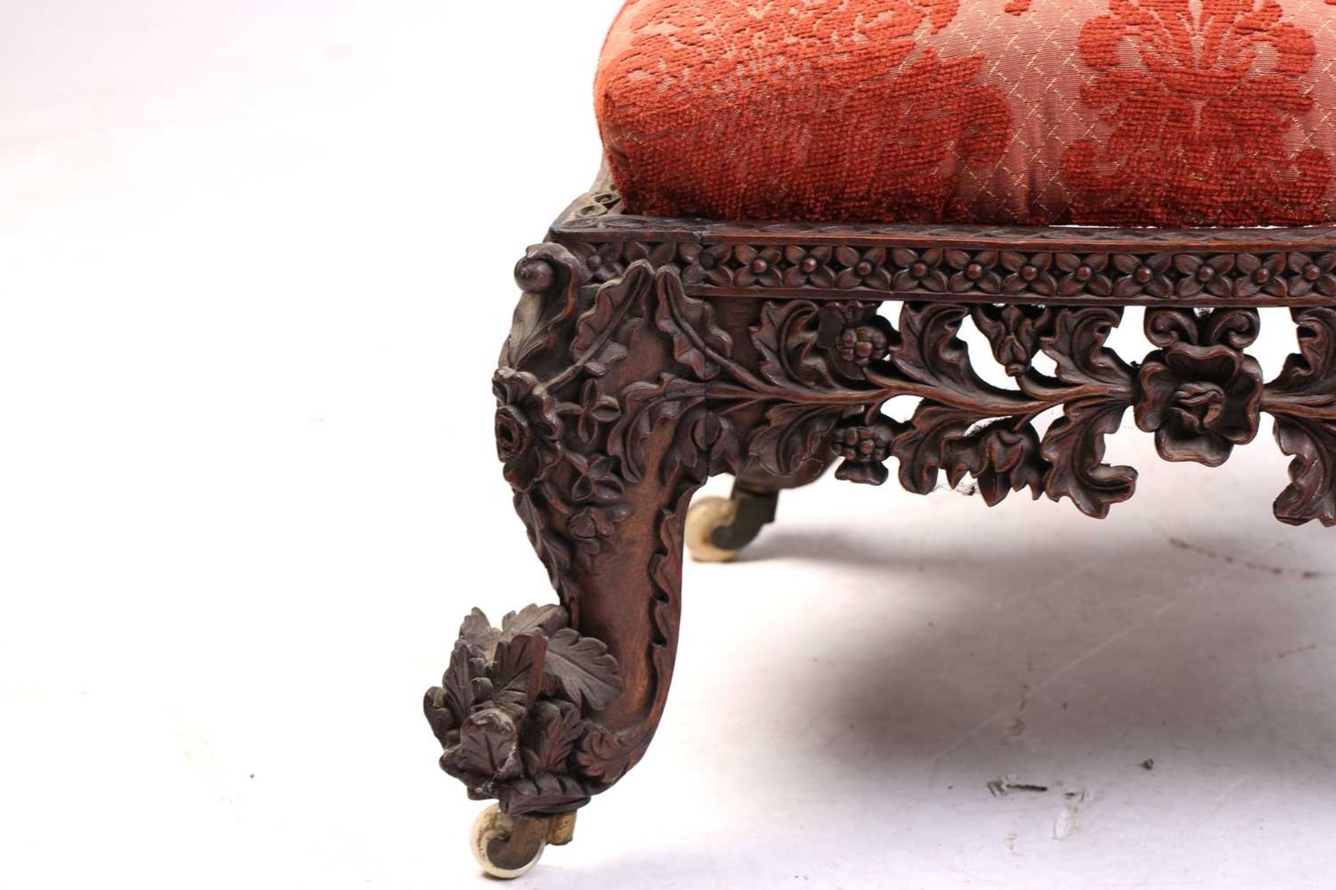 In the manner of The Ahmedabad Carving Company; an Anglo-Indian/ Burmese padauk wood slipper - Image 4 of 12