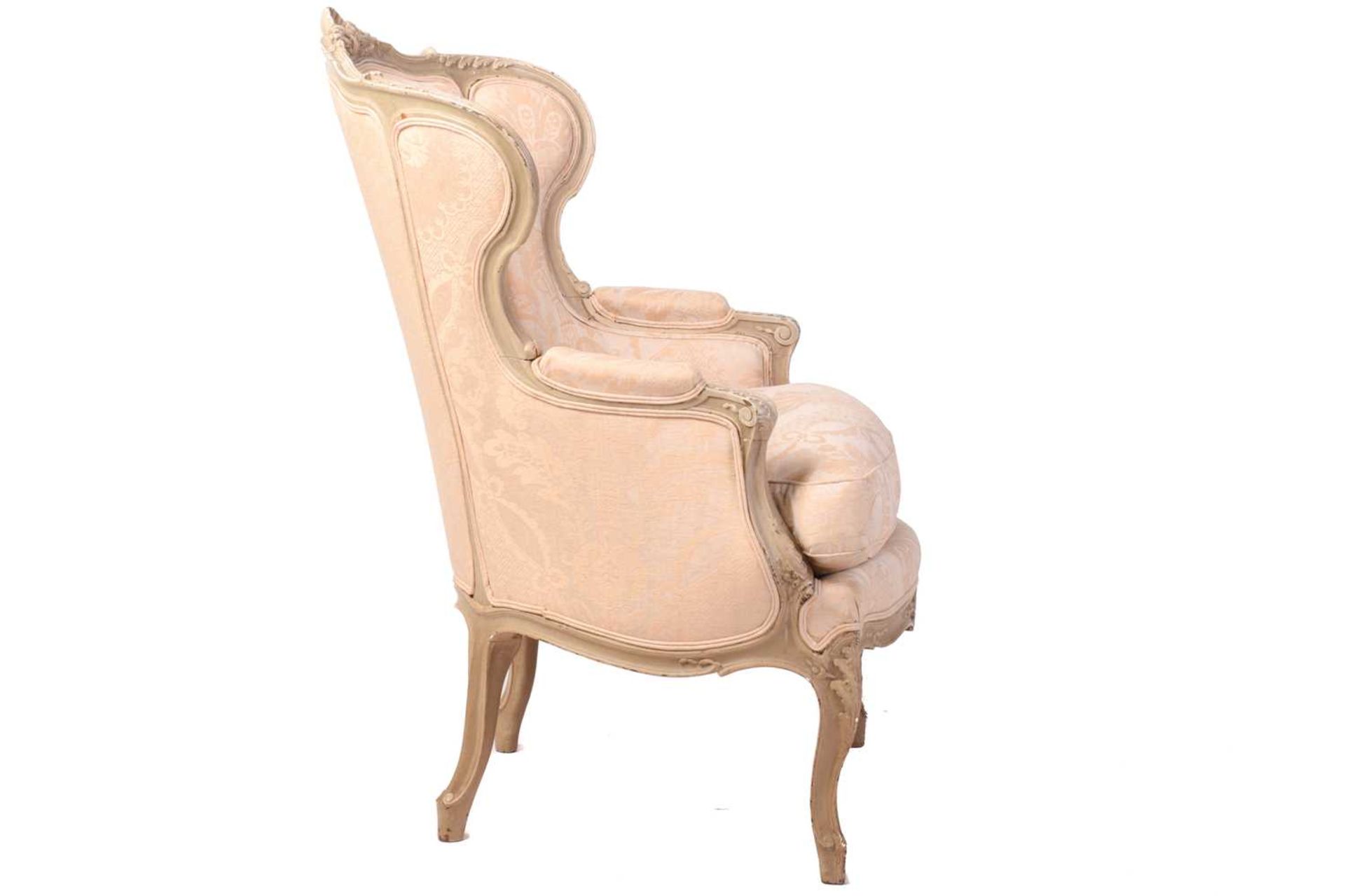 A French Louis XV-style dove grey painted bergere armchair with wing back and carved shell - Image 2 of 8