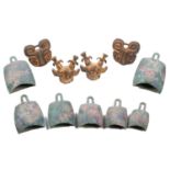A set of seven Chinese Han-style graduated temple bells, together with four stag furniture mounts,