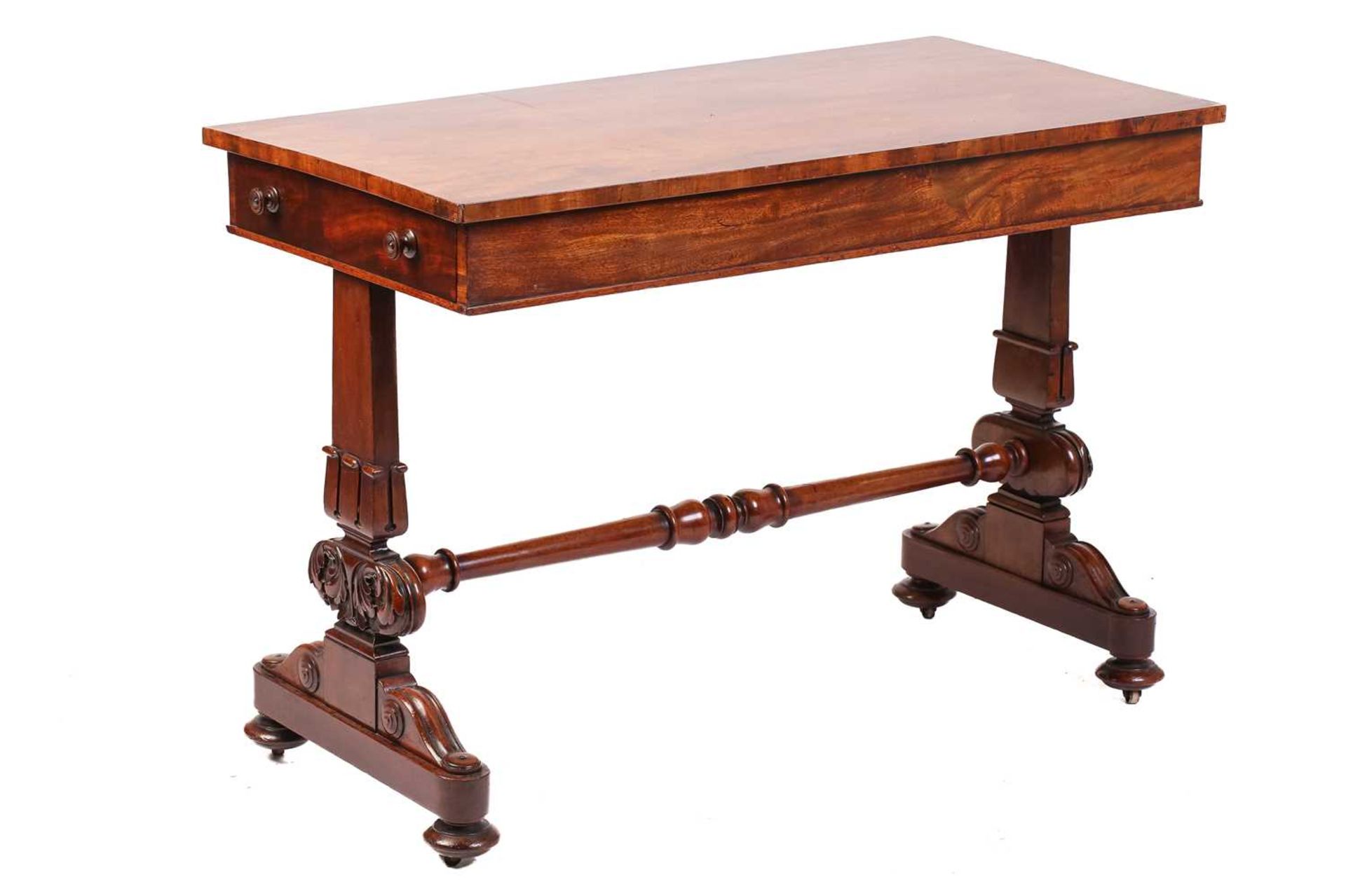 An early Victorian mahogany rectangular side table with unusually configured end frieze drawers on