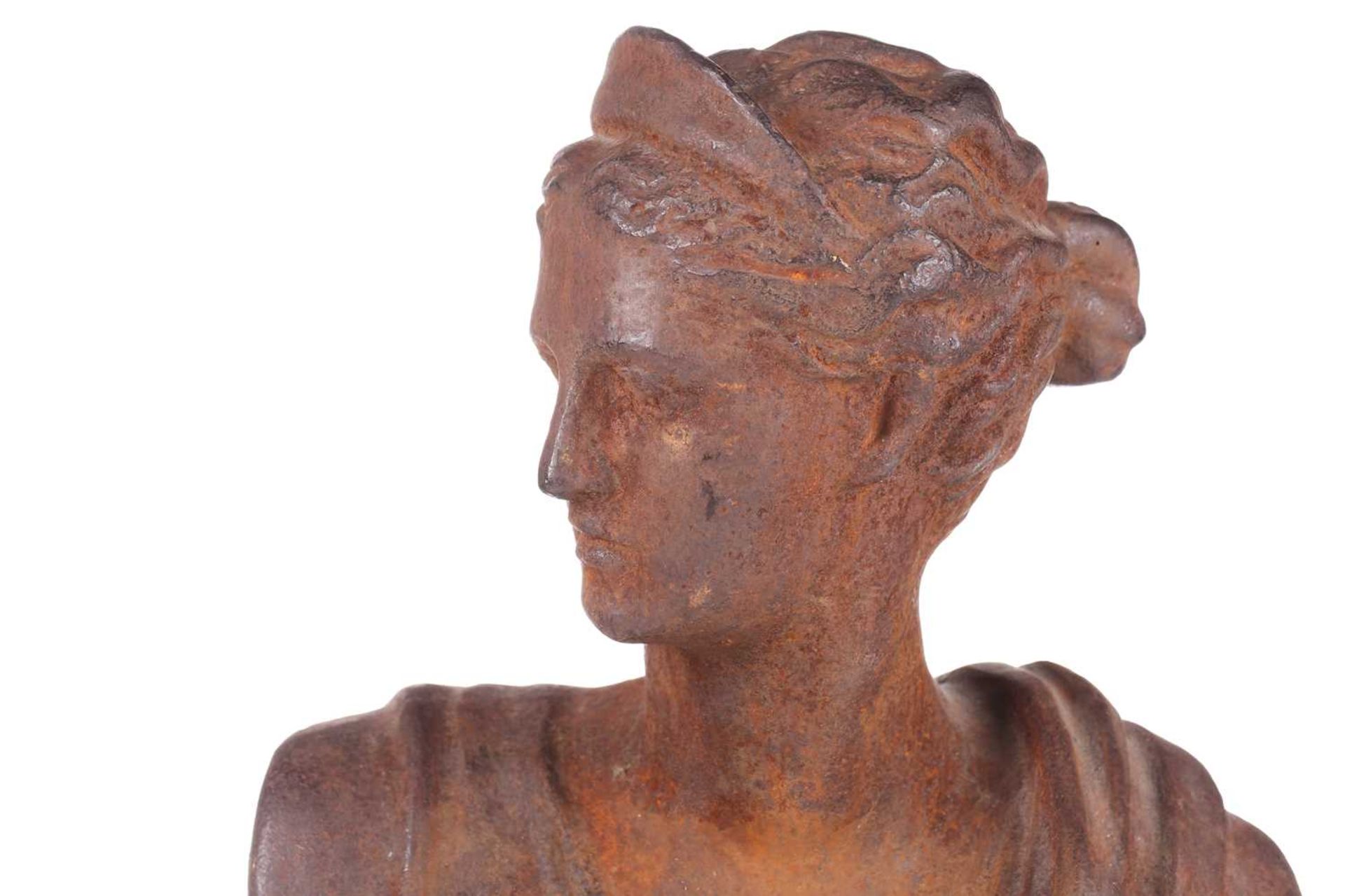 A classical cast iron bust study of Diana the Huntress on a concave moulded socle. 52 cm high. - Image 5 of 5