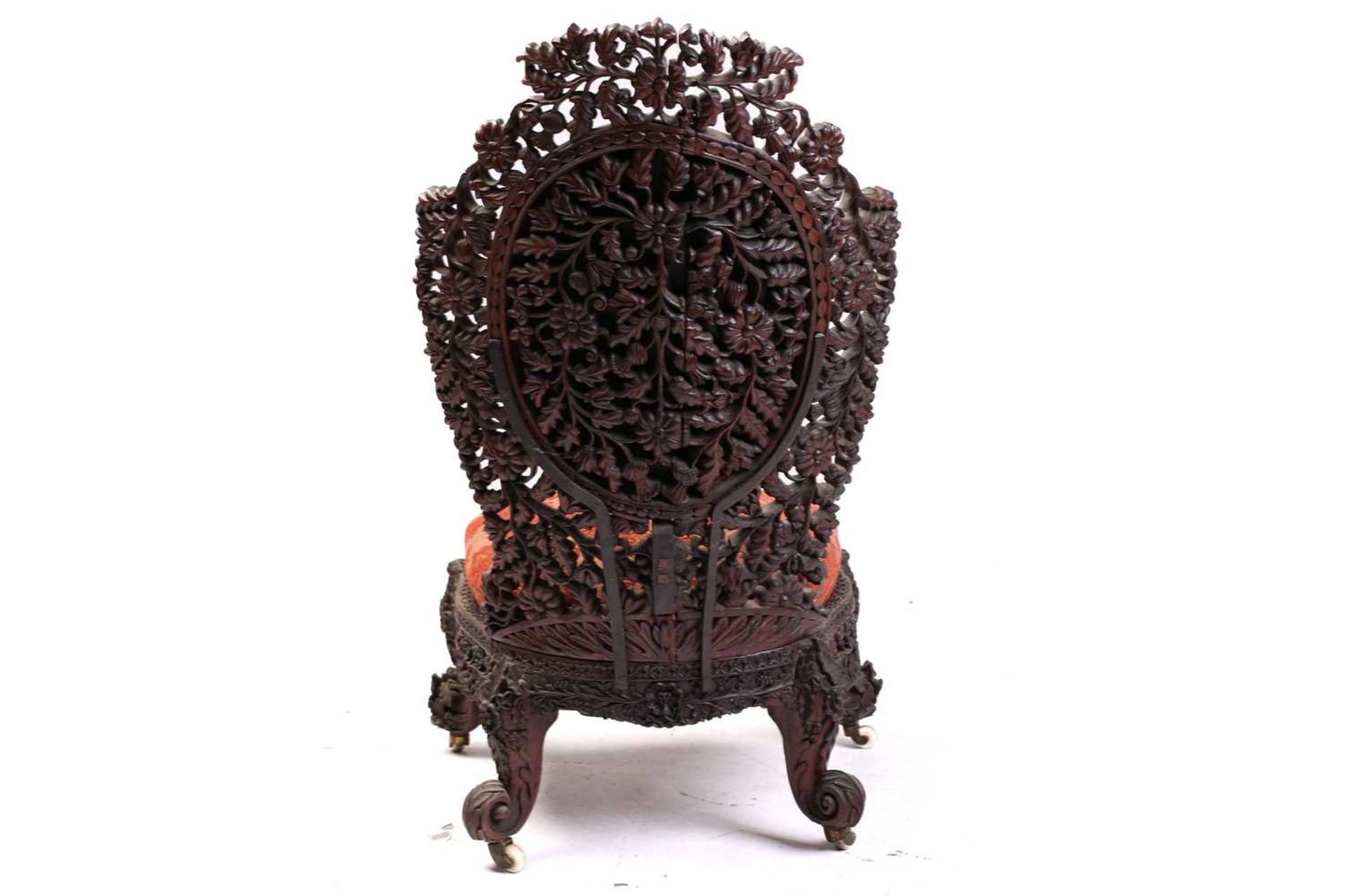 In the manner of The Ahmedabad Carving Company; an Anglo-Indian/ Burmese padauk wood slipper - Image 9 of 12