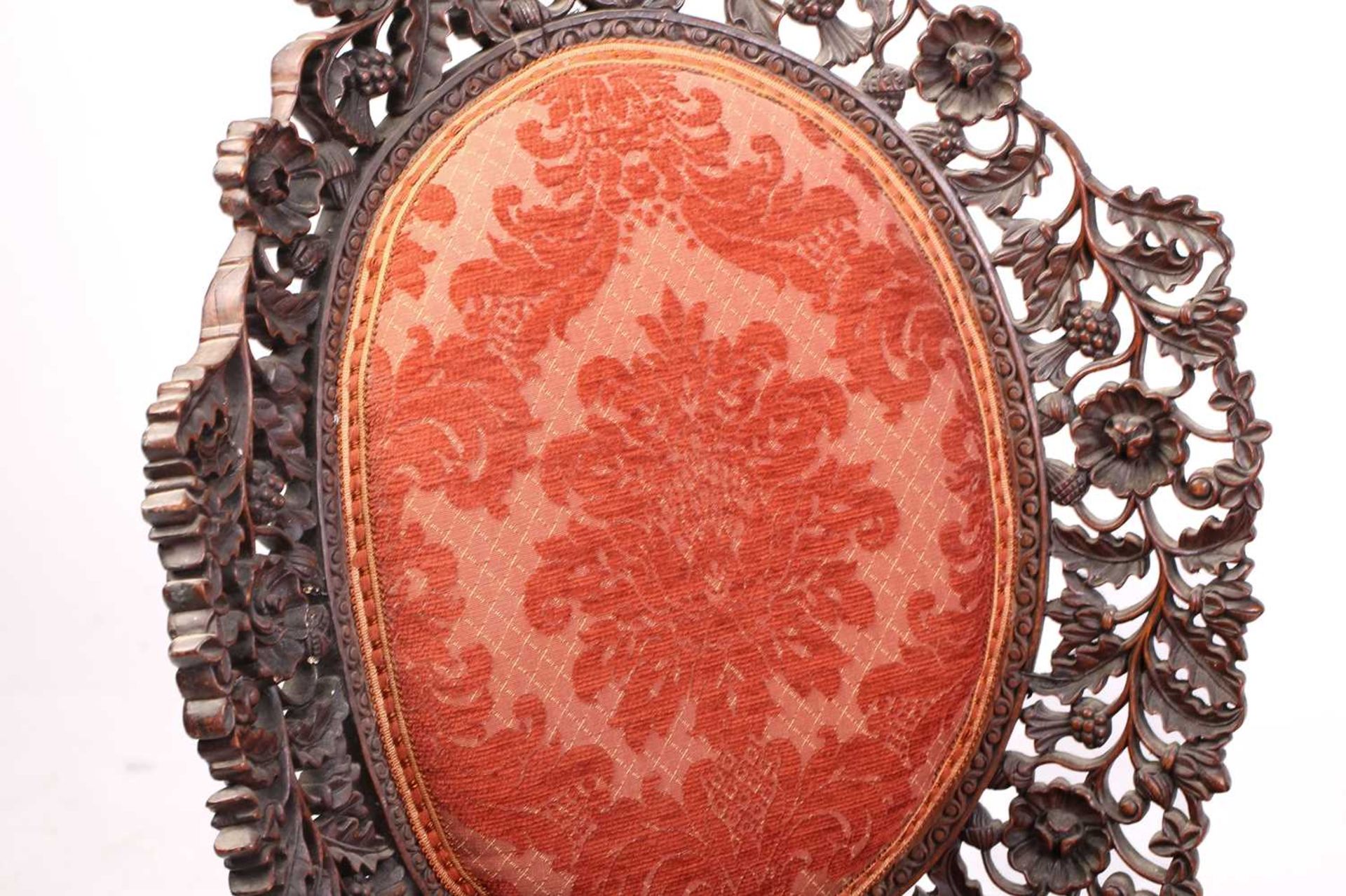 In the manner of The Ahmedabad Carving Company; an Anglo-Indian/ Burmese padauk wood slipper - Image 5 of 12