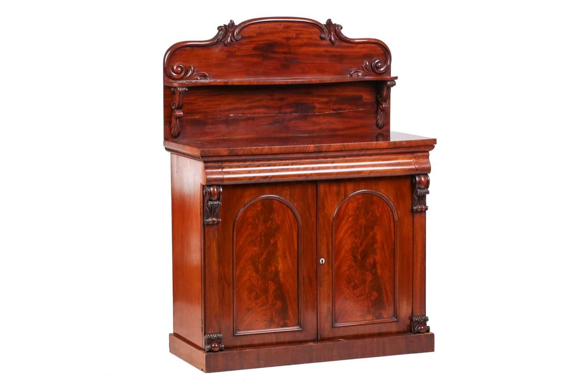 Victorian mahogany chiffonier with an ogee moulded frieze drawer above a pair of arched panel