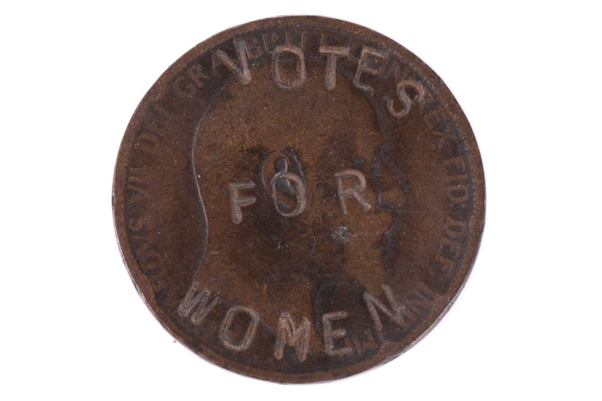 Of suffragette interest, an Edward VII penny dated 1902, defaced with the words 'VOTES FOR WOMEN',