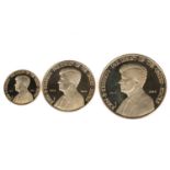 A President John F Kennedy memorial gold medal set, circa 1965, comprising three medals in 18ct