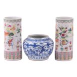 A pair of Chinese porcelain sleeve vases, early 20th century, painted with a band of ruyi heads