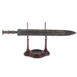 A Chinese bronze sword, Han Dynasty (206 BC- 220 AD), cast with a disc rim forming the pommel, the
