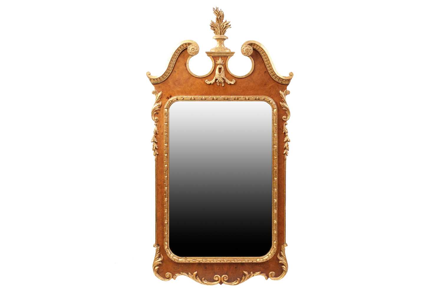 A George I style walnut and parcel gilt rectangular wall mirror in the "Kentian" style, 20th