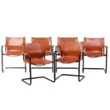 A set of six cantilever armchairs after Mart Stam, S34, on tubular frames with tan leather seats and