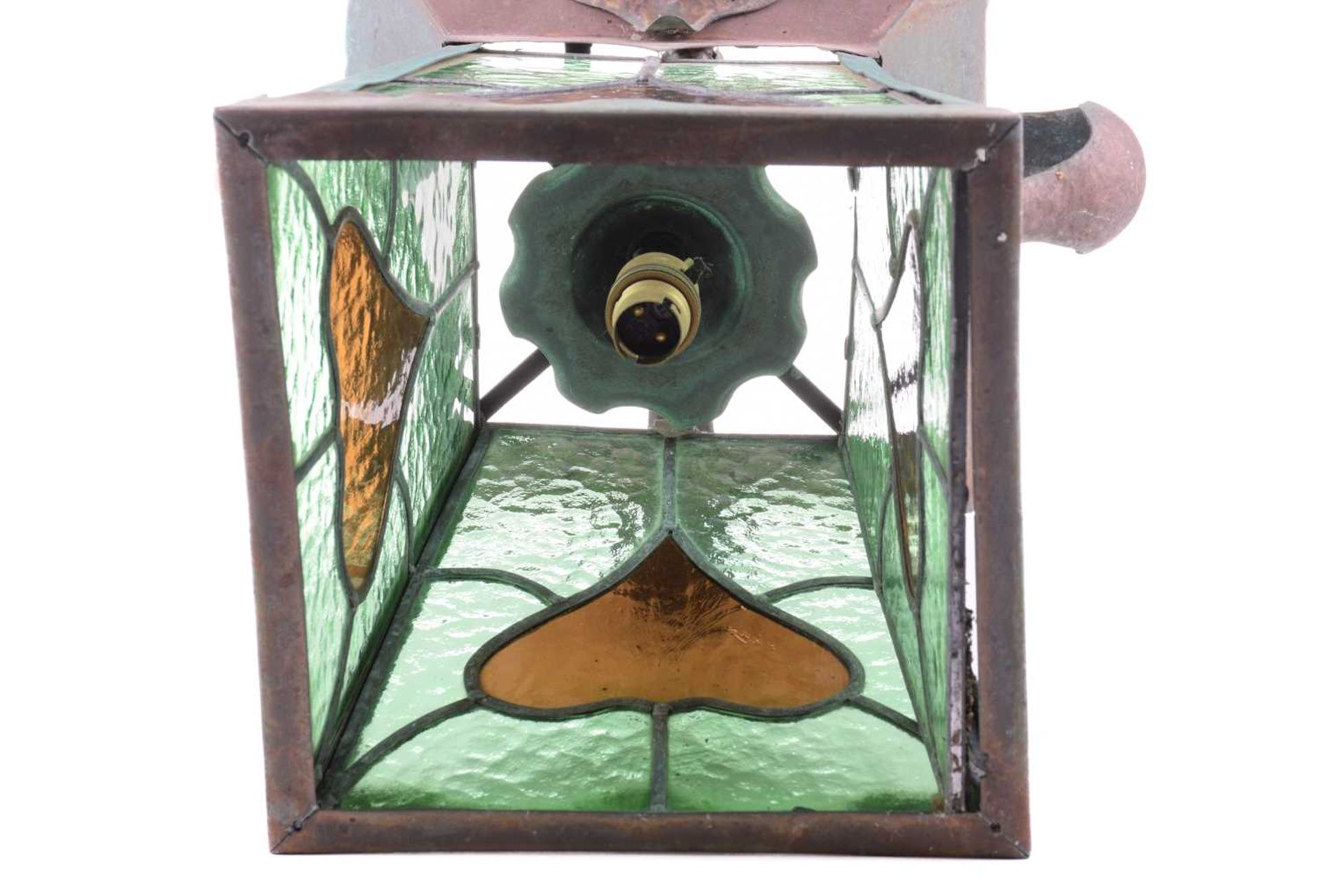 An Arts and Crafts brass and leaded glass ceiling lantern, with four shaped and studded upper - Image 5 of 8