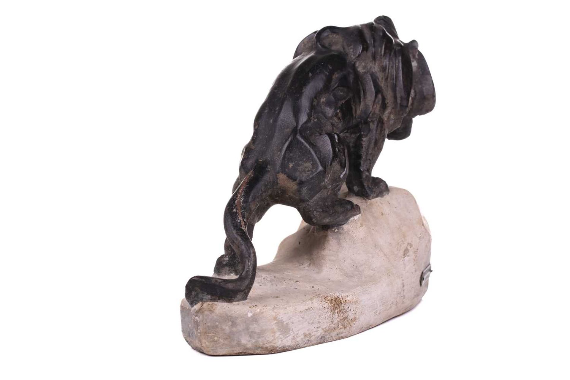 J. Colombini, a patinated composite sculpture of a lion on a rock outcrop, incised signature with - Image 3 of 7