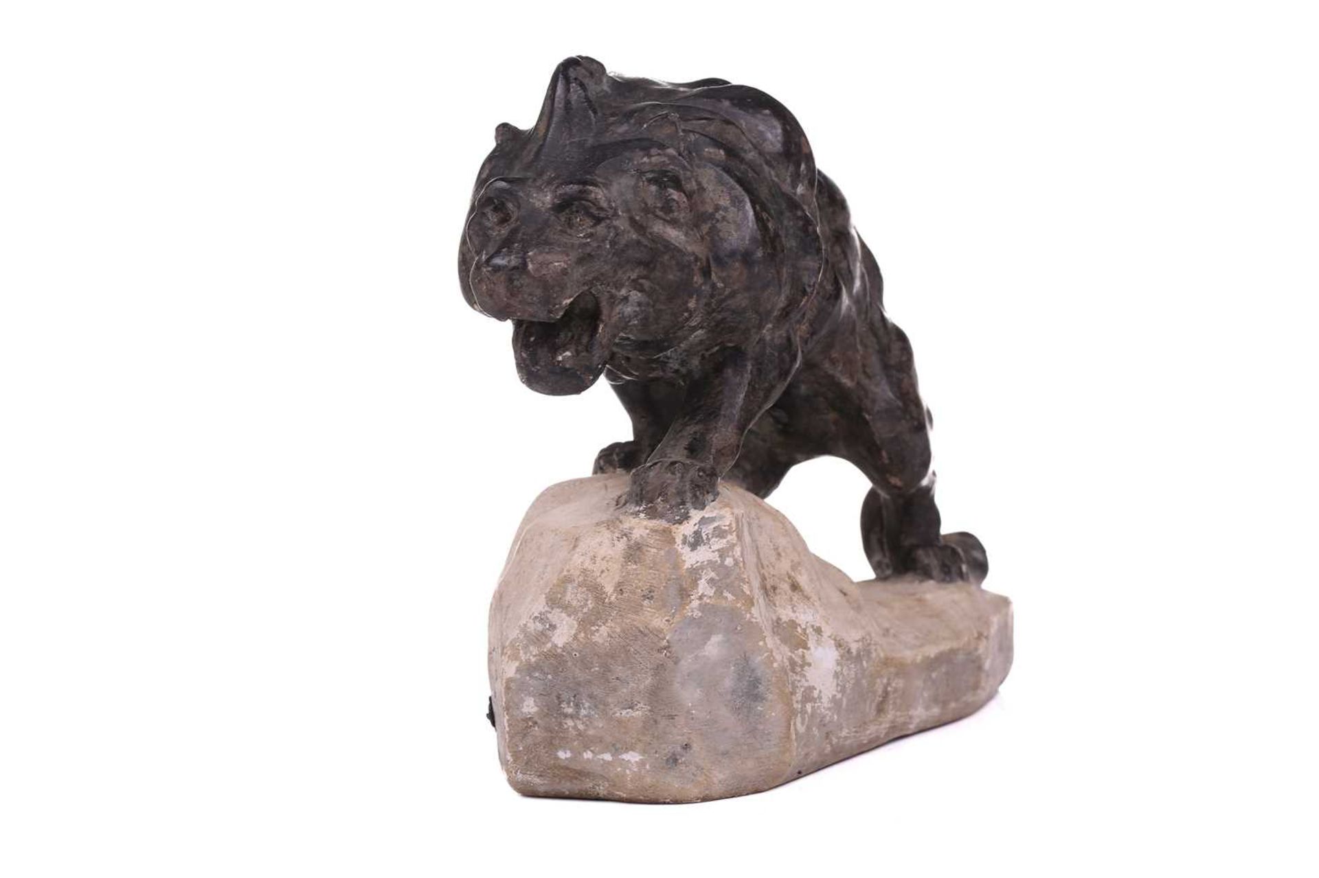 J. Colombini, a patinated composite sculpture of a lion on a rock outcrop, incised signature with - Image 4 of 7