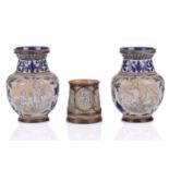 A pair of Doulton Lambeth stoneware vases, by Mary Mitchell, sgraffito decorated with circular