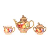 A Royal Worcester fruit-decorated three-piece miniature tea set, each signed 'Roberts' for Frank